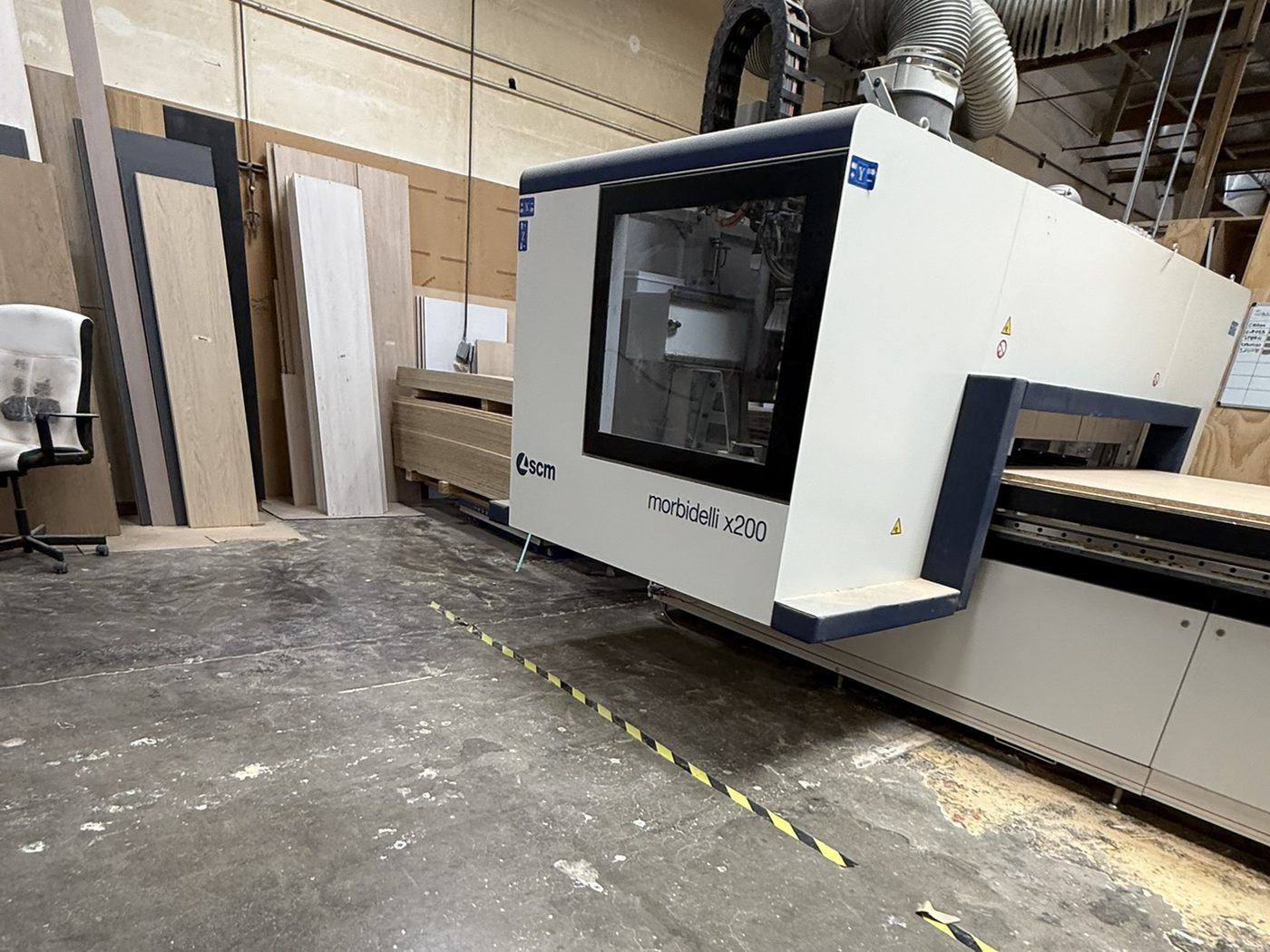 SCM Morbidelli X200 CNC router and plywood stock in the San Diego shop — Luxe Carpentry Group, San Diego